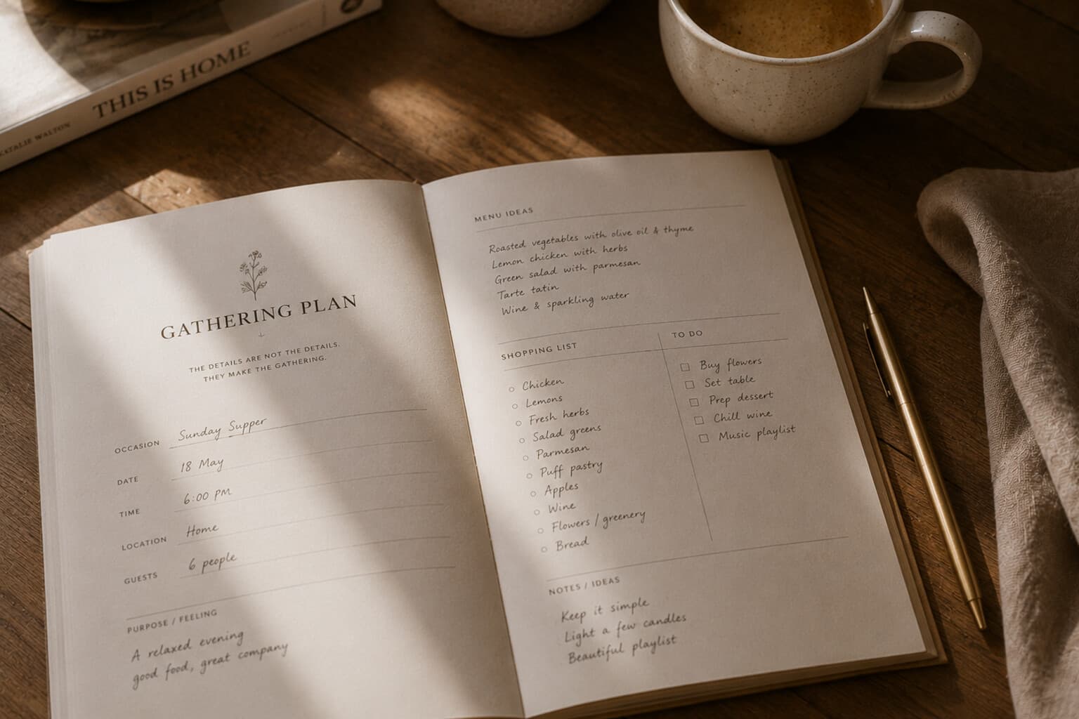 A planning page for a gathering laid open on a table beside a pen and a cup of coffee.