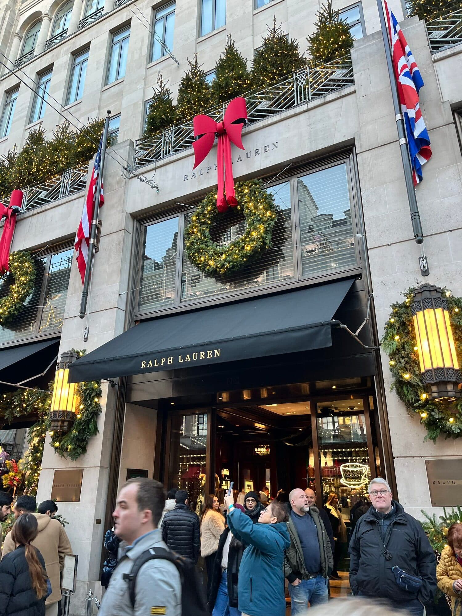 Ralph Lauren storefront in London decorated with wreaths and flags for Christmas