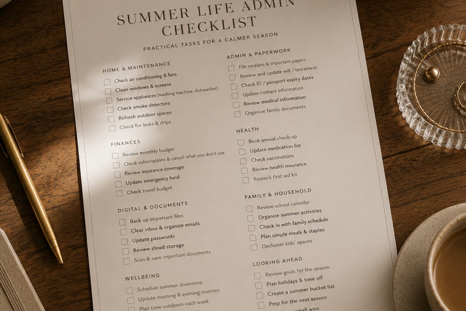 A single printed checklist page covering a season’s practical life admin, laid on a desk.