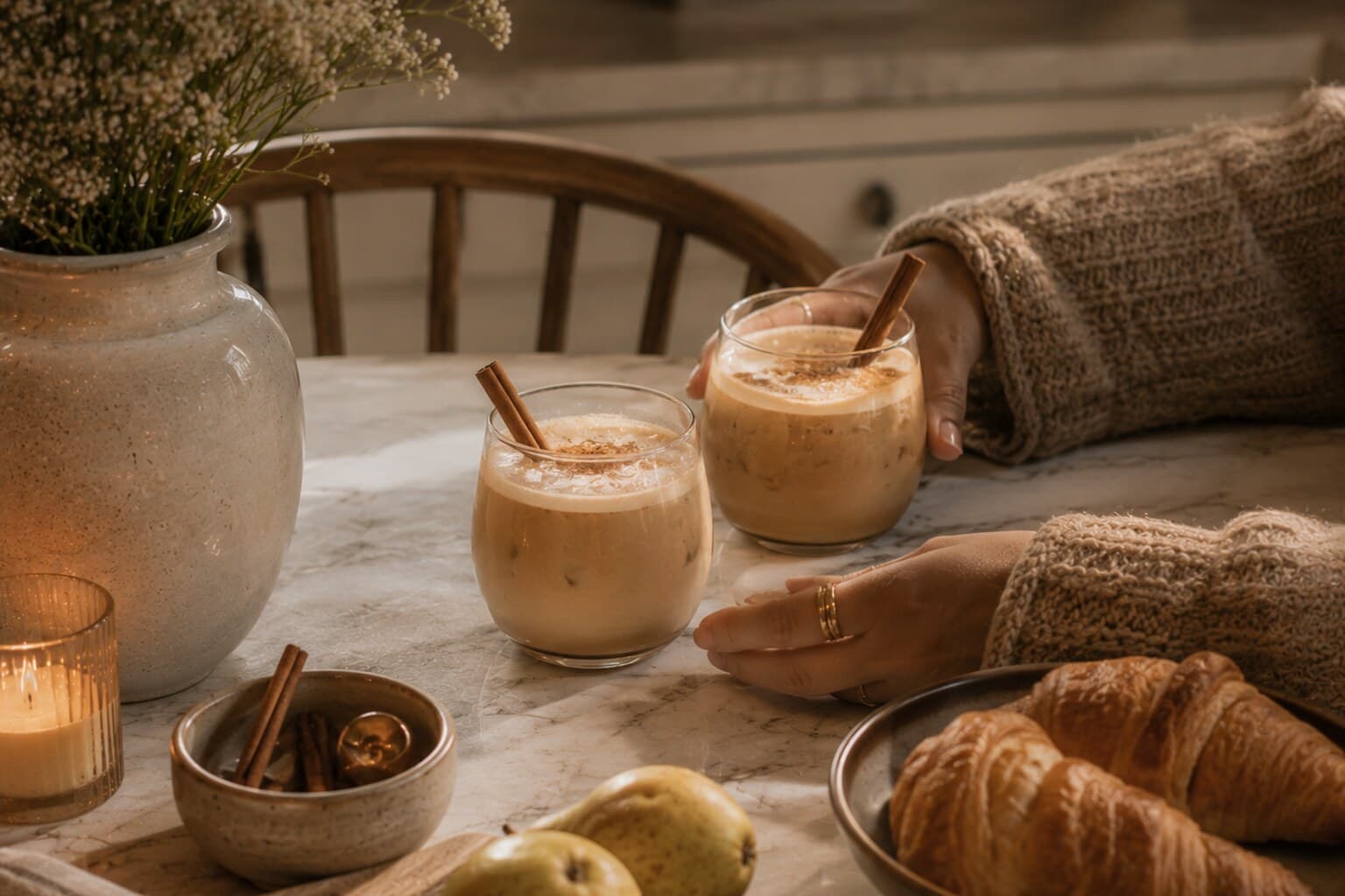 A signature seasonal drink poured and shared at a kitchen table.