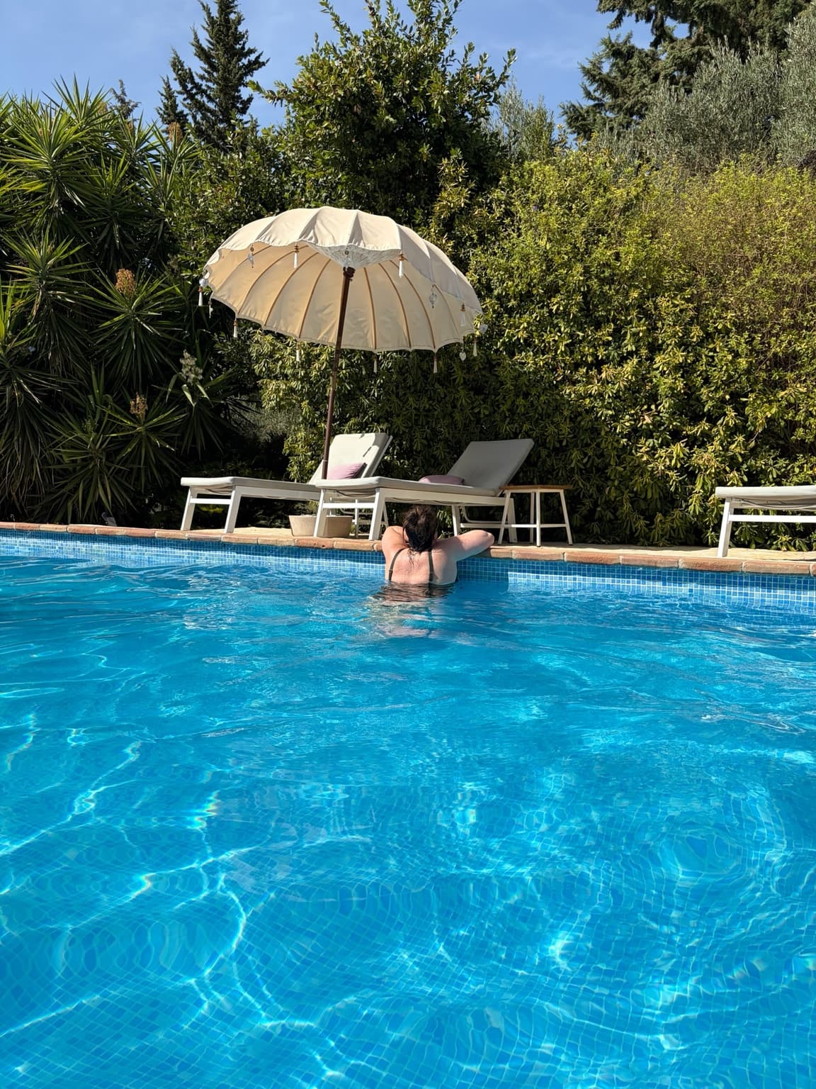 Esther swimming in the large pool at Casa Baliza, Andalusia