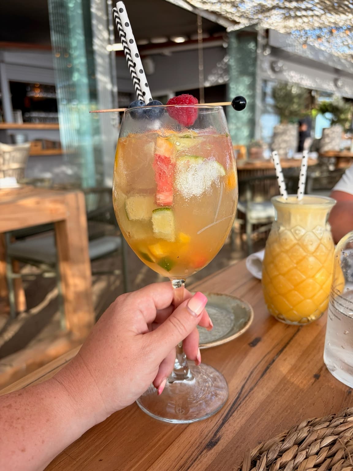 A cocktail at LUUMA Beach in the afternoon light