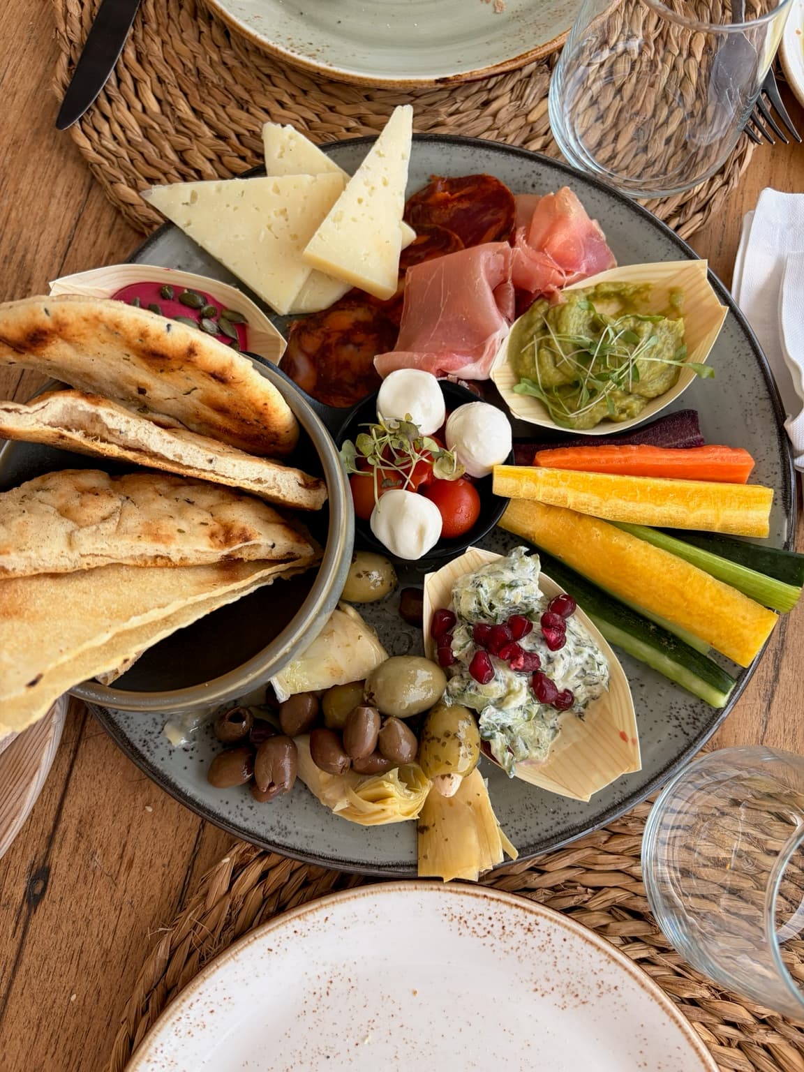 A sharing platter of food at LUUMA Beach