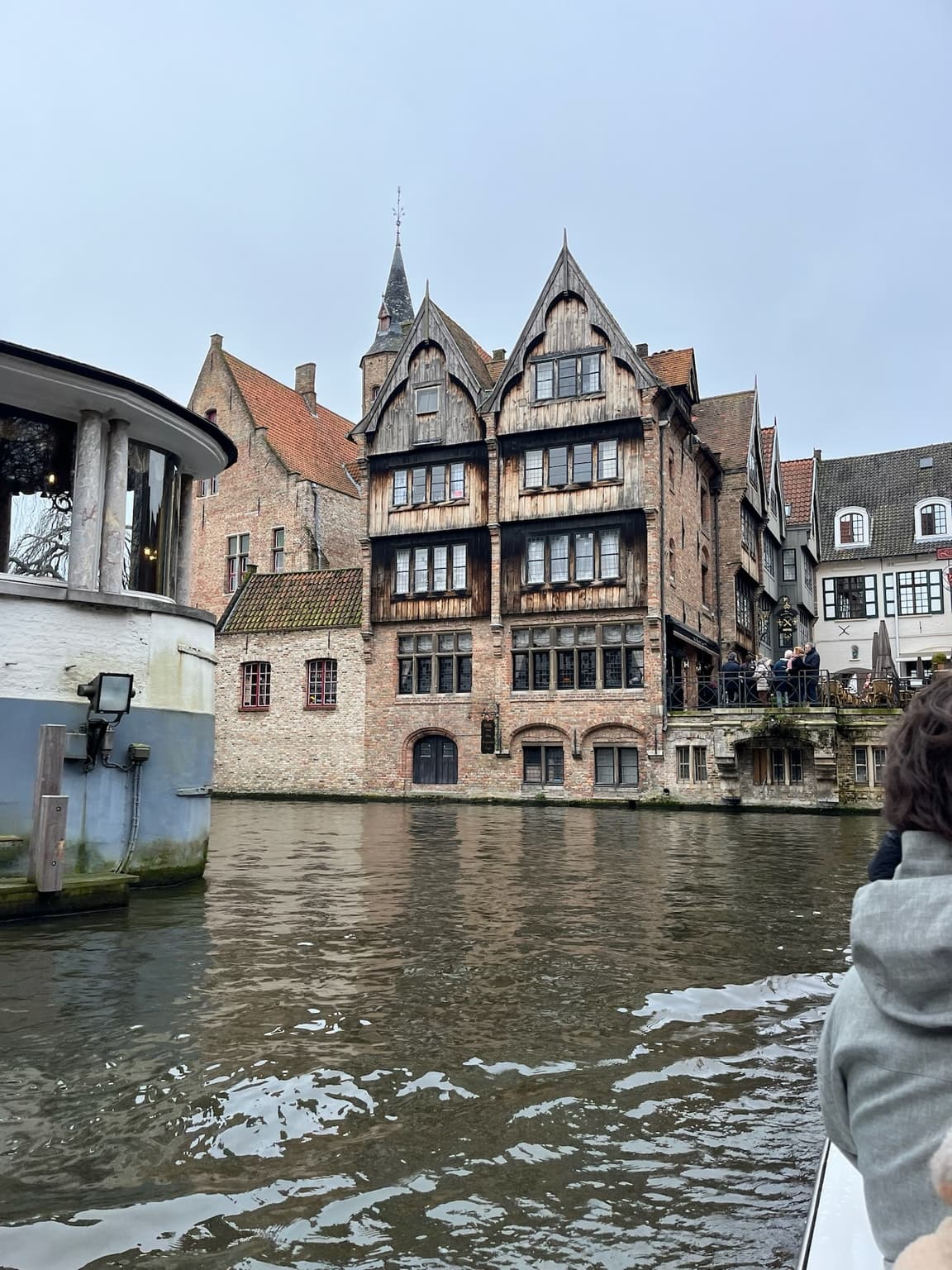 Historic canal houses seen during a boat tour through Bruges, Belgium