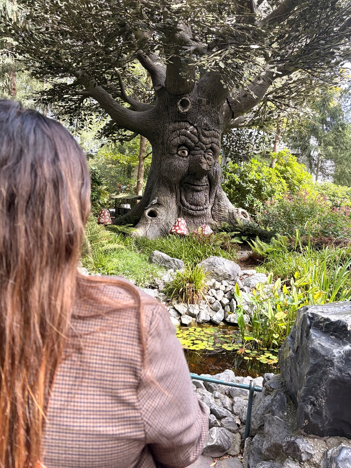 Esther looking towards the Sprookjesboom in the Efteling Fairytale Forest