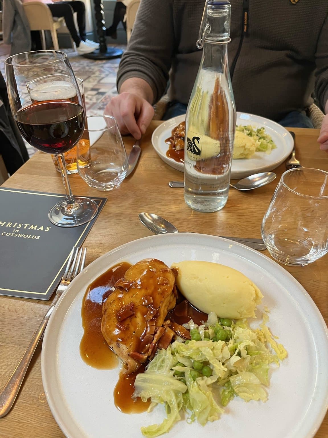Roast chicken with gravy, mashed potatoes and vegetables at The Swan Hotel in Bibury